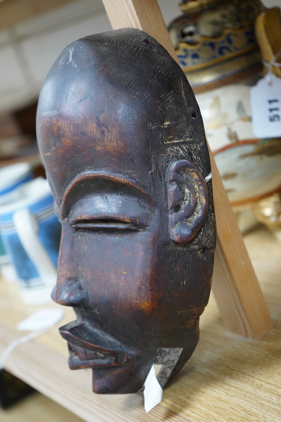An African Guro tribe hardwood mask, 27cm high